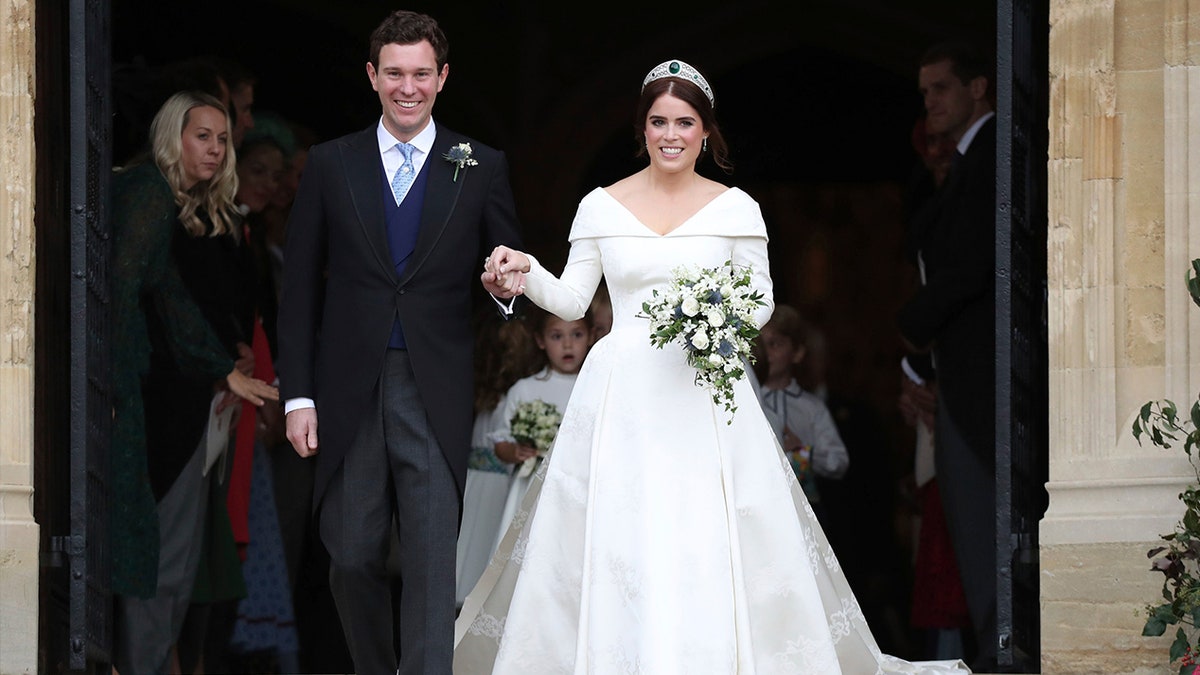 Princess Eugenie of York and Jack Brooksbank after their wedding ceremony at St George’s Chapel, Windsor Castle, near London, England, Friday Oct. 12, 2018. (Steve Parsons, Pool via AP)