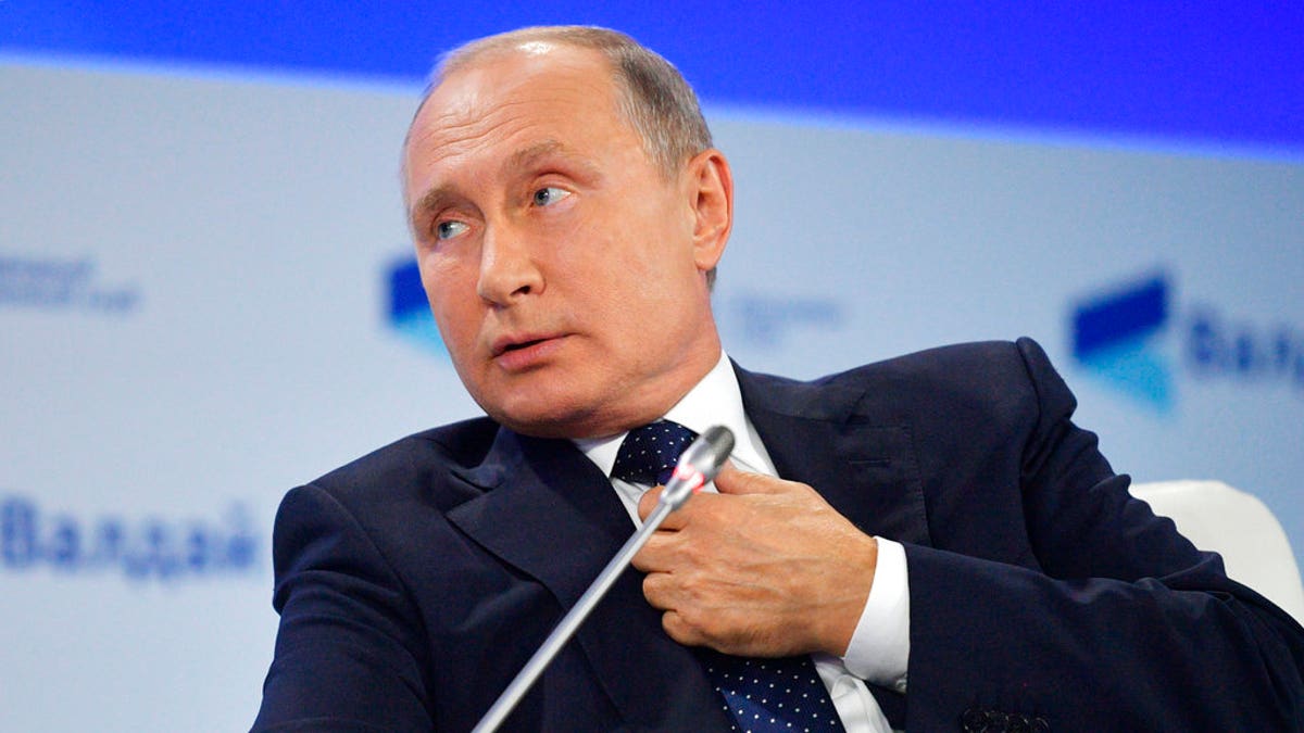 FILE: Russian President Vladimir Putin speaking at a meeting of the Valdai International Discussion Club in Sochi, Russia.