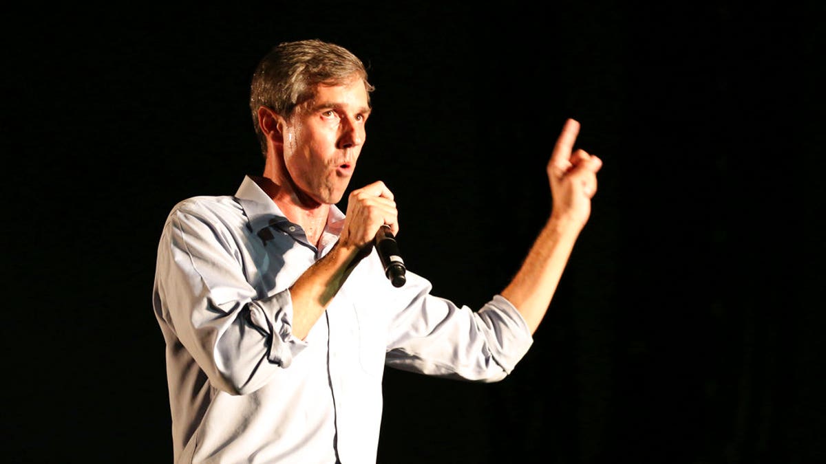 FILE: Democratic Texas Senate candidate Beto O'Rourke speaks to the crowd during the "Turn Out for Texas" concert and rally at Auditorium Shores.