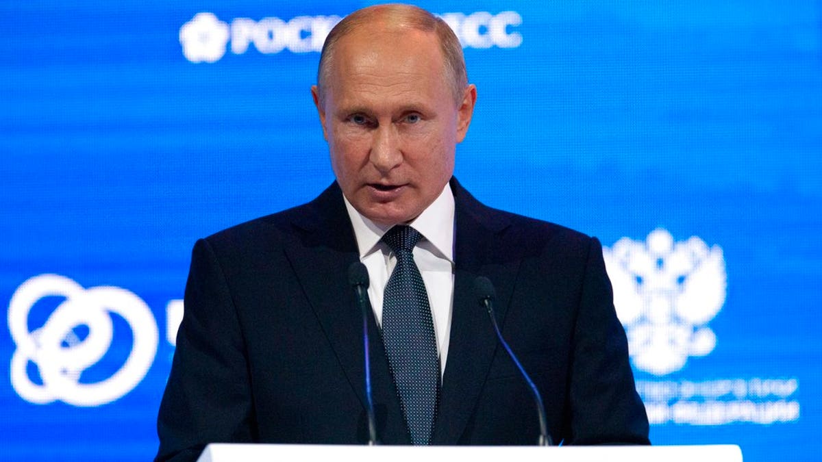 Russian President Vladimir Putin speaks at the Russian Energy Week International Forum in Moscow on Wednesday