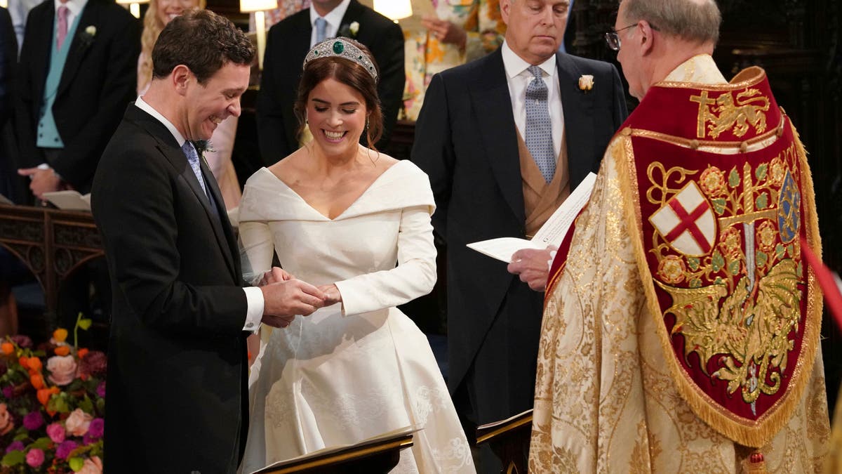 The Rt Revd David Conner, Dean of Windsor conducts the wedding ceremony between Princess Eugenie of York and Jack Brooksbank in St George’s Chapel, Windsor Castle, near London, England, Friday Oct. 12, 2018. (Jonathan Brady, Pool via AP)
