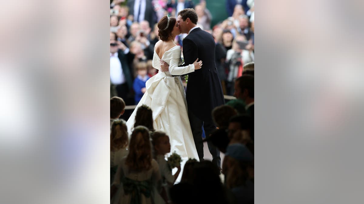 Princess Eugenie of York and Jack Brooksbank kiss after their wedding in St George’s Chapel, Windsor Castle, near London, England, Friday Oct. 12, 2018. (Yui Mok, Pool via AP)