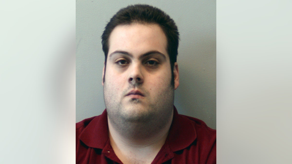 Daniel Frisiello, of Beverly, Mass., is accused of mailing five envelopes in February with threatening messages and a white substance, including one to Donald Trump Jr., that landed his wife, Vanessa, in the hospital. (Beverly Police Department via AP, File)