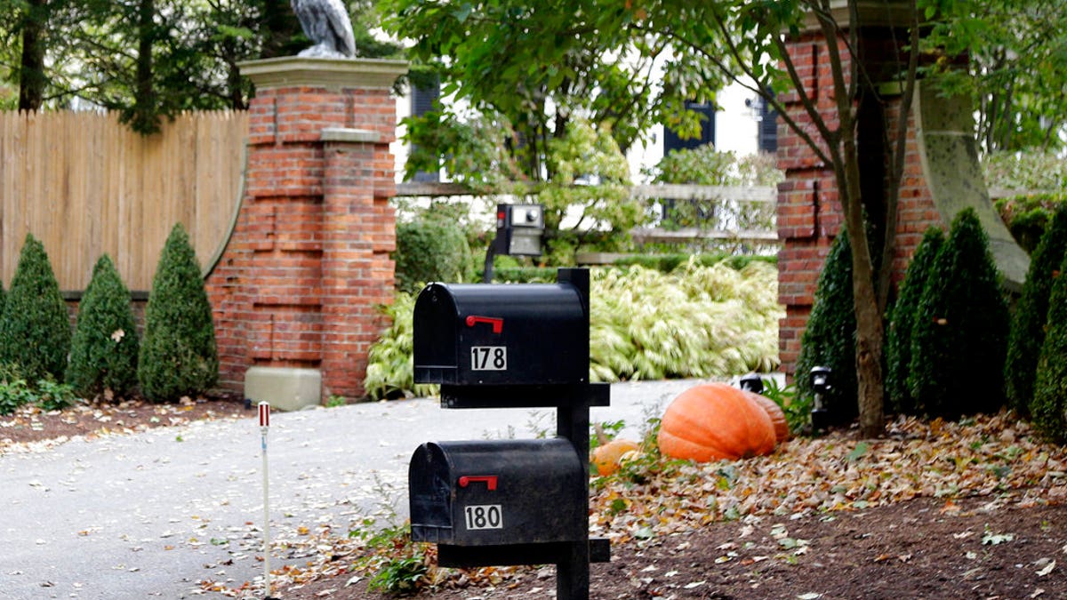 Mailboxes stand outside the entrance to a house owned by philanthropist George Soros in Katonah, N.Y., a suburb of New York City, Tuesday, Oct. 23, 2018. A device found outside the compound "had the components" of a bomb, including explosive powder, a law enforcement official said Tuesday. (AP Photo/Seth Wenig)