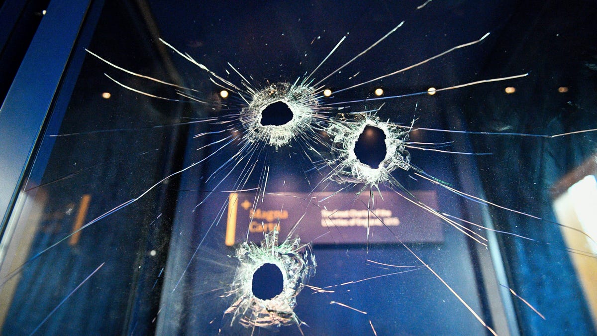 Hammer holes in the glass case that housed the Magna Carta, at Salisbury Cathedral after a 45-year-old man has been arrested on suspicion of its attempted theft, in Salisbury, England. (Ben Birchall/PA via AP)