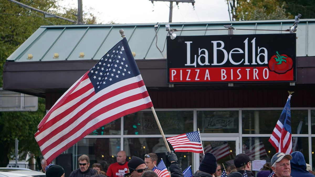 The front of La Bella Pizza Bistro in New Paltz, NY where hundreds in the community showed support for the proposed American flag mural.