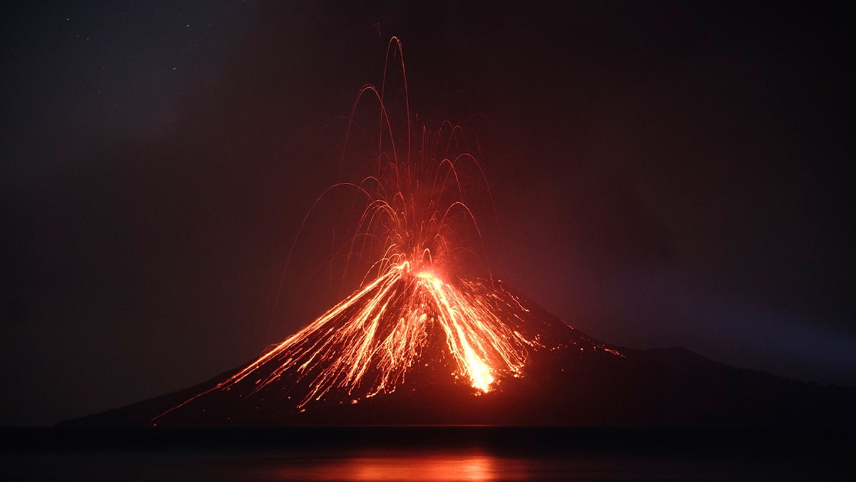 Lava streams down from Anak Krakatau (Child of Krakatoa) volcano during an eruption as seen from Rakata island in South Lampung on July 19, 2018 - file photo.