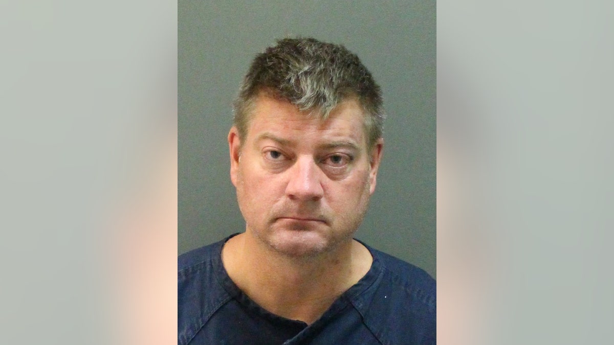 The man, identifed by police as Brandon Strong, was transported to the Orange County Jail.
