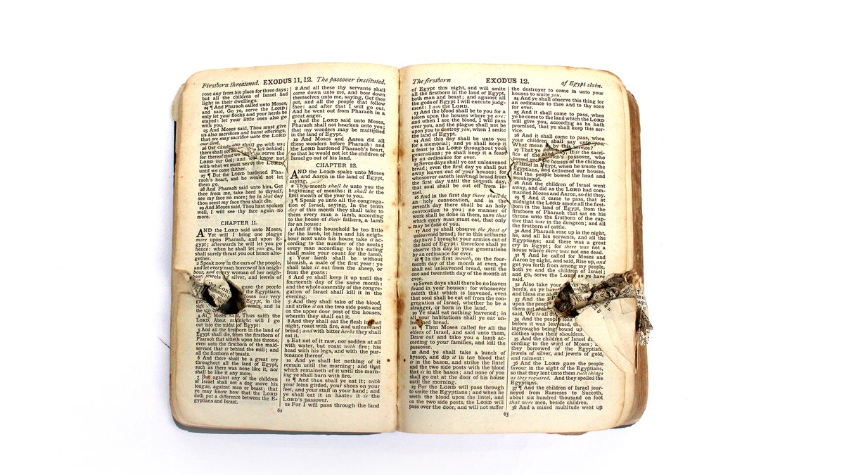 The Bible was damaged when a German plane machine-gunned a makeshift hospital.
