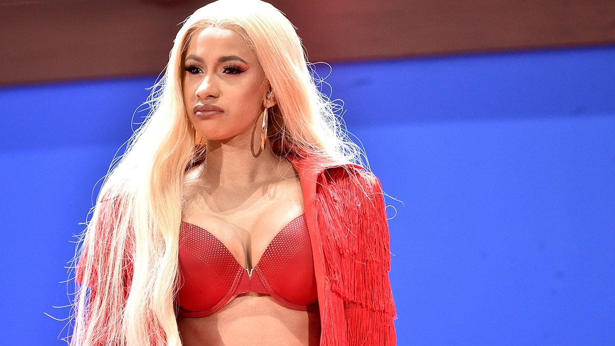 Cardi B will reportedly turn herself into police in New York City after a brawl at a Queens strip club.