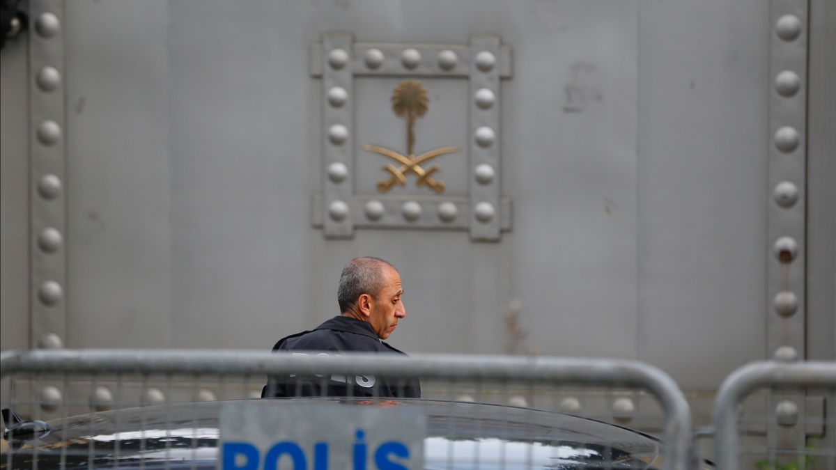 A Turkish police officer patrols outside the Saudi Arabia consulate in Istanbul.