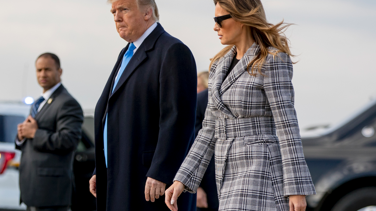 President Donald Trump and first lady Melania Trump arrive at Pittsburgh International Airport in Coraopolis, Pa., Tuesday, Oct. 30, 2018, following last weekends shooting at Tree of Life Synagogue in Pittsburgh. (AP Photo/Andrew Harnik)