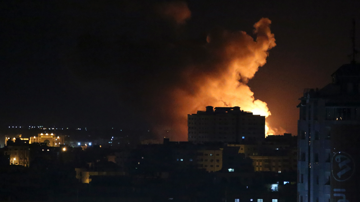 Smoke rises from an explosion caused by an Israeli airstrike on Gaza City last month (AP Photo/Adel Hana)