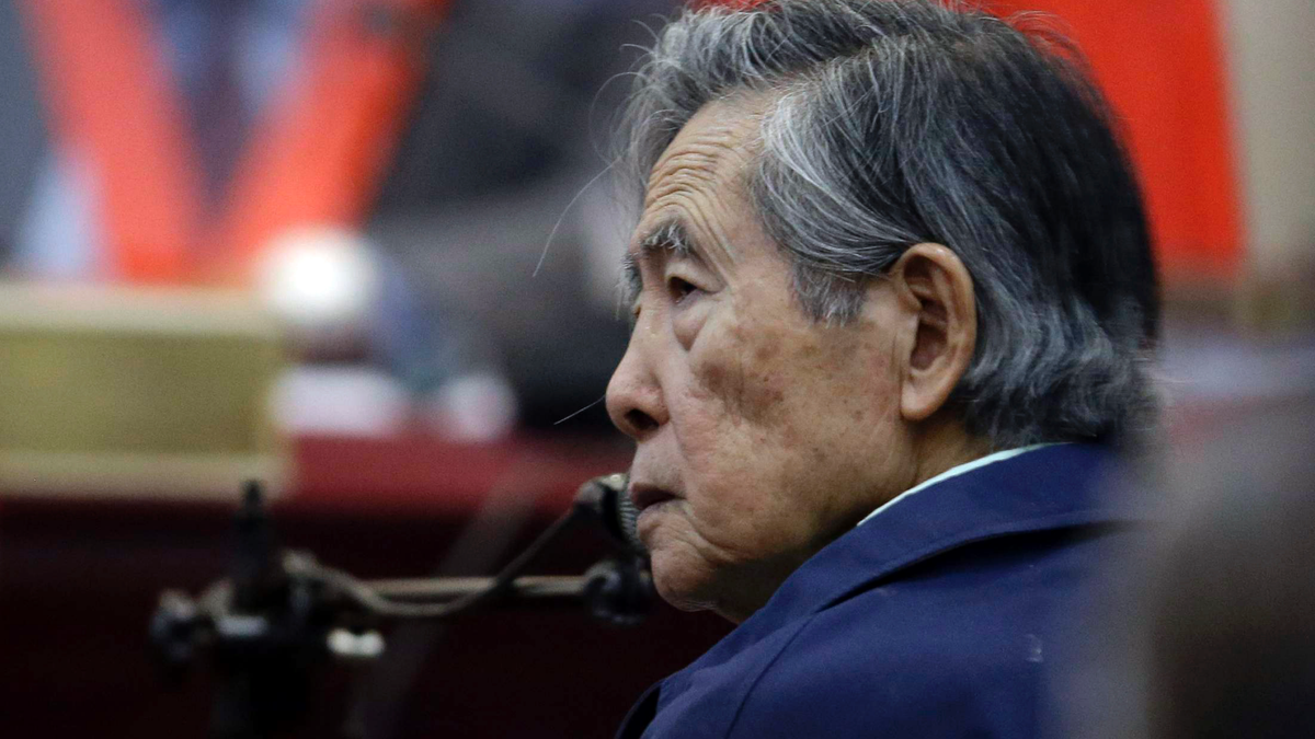 In this March 15, 2018 file photo, Peru's former President Alberto Fujimori listens to a question during his testimony in a courtroom at a military base in Callao, Peru. (AP Photo/Martin Mejia, File)