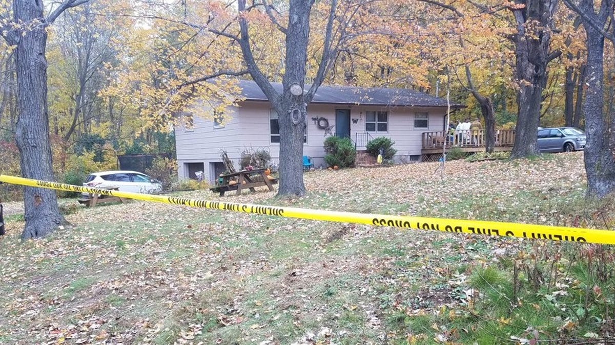 Police responded to a 911 call just before 1 a.m. at a home west of Barron, Wisconsin.