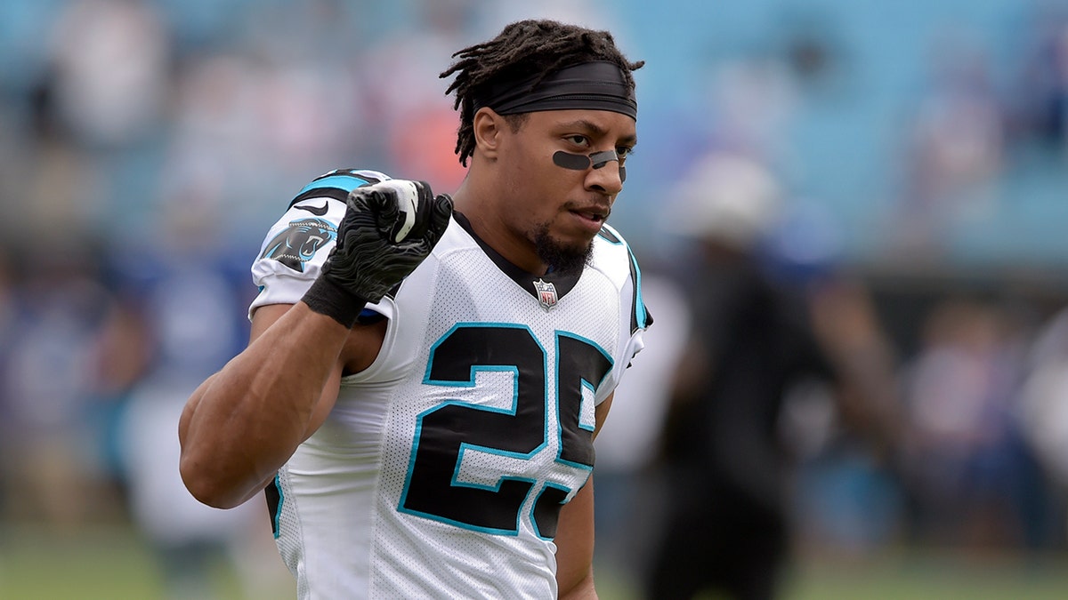 The Carolina Panthers' Eric Reid (25) takes the field before an NFL football game against the New York Giants in Charlotte, N.C., Sunday, Oct. 7, 2018. (AP Photo/Mike McCarn)