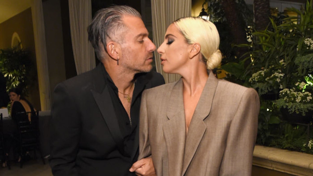 Christian Carino (L) and Lady Gaga attend ELLE's 25th Annual Women In Hollywood Celebration in 2018. 