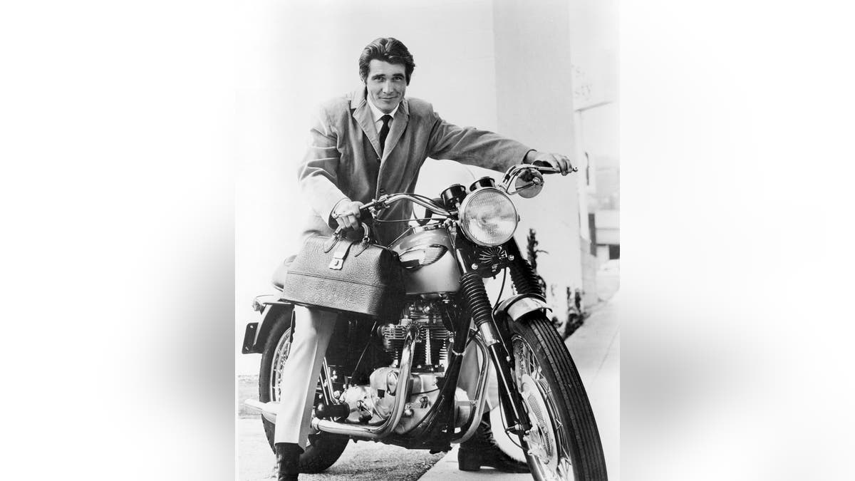 American actor James Brolin astride a motorcycle, as Dr. Steven Kiley in the US television drama "Marcus Welby, MD" 1969.