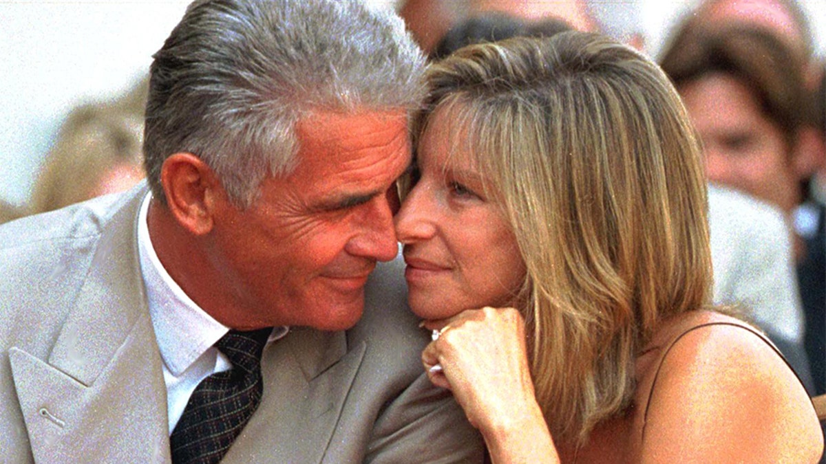 James Brolin and his singer-actress wife Barbra Streisand, 74, share a tender moment during the Hollywood Walk of Fame ceremony for Brolin.