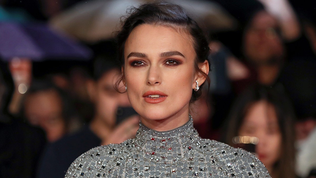 Keira Knightley explains why she wore that hat in the 2003 film "Love Actually."