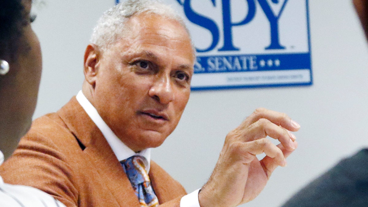 In this Oct. 5, 2018 photograph, Mike Espy, a former congressman and former U.S. agriculture secretary, speaks to college and high school students in a small forum on education in Jackson, Miss. Espy hopes to unseat appointed U.S. Sen. Cindy Hyde-Smith, R-Miss., and serve the last two years of the six-year term vacated when Republican Thad Cochran retired for health reasons. There are two other opponents in the non-partisan race. (AP Photo/Rogelio V. Solis)
