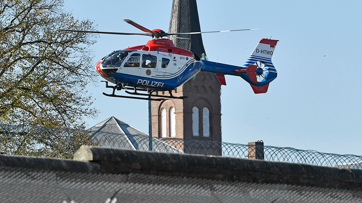A helicopter carrying Mounir el-Motassadeq takes off from the prison in Hamburg.