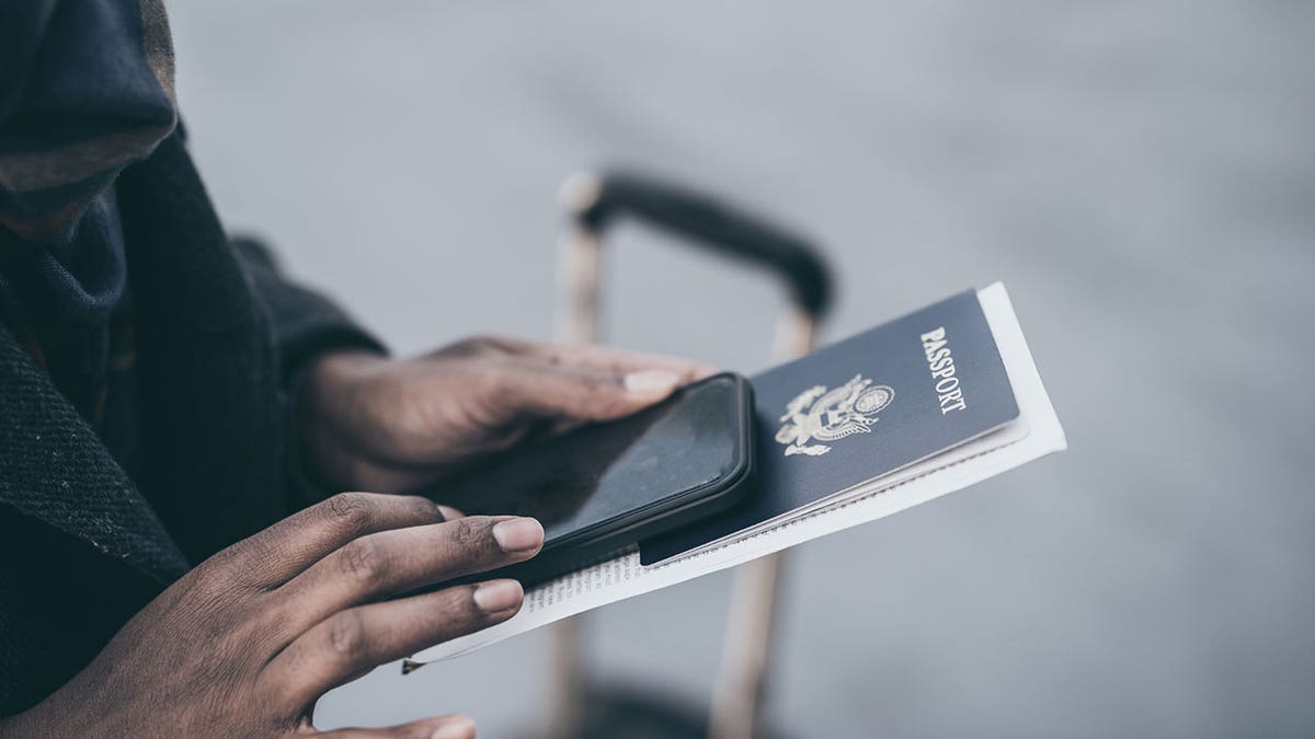 American passport held in hands