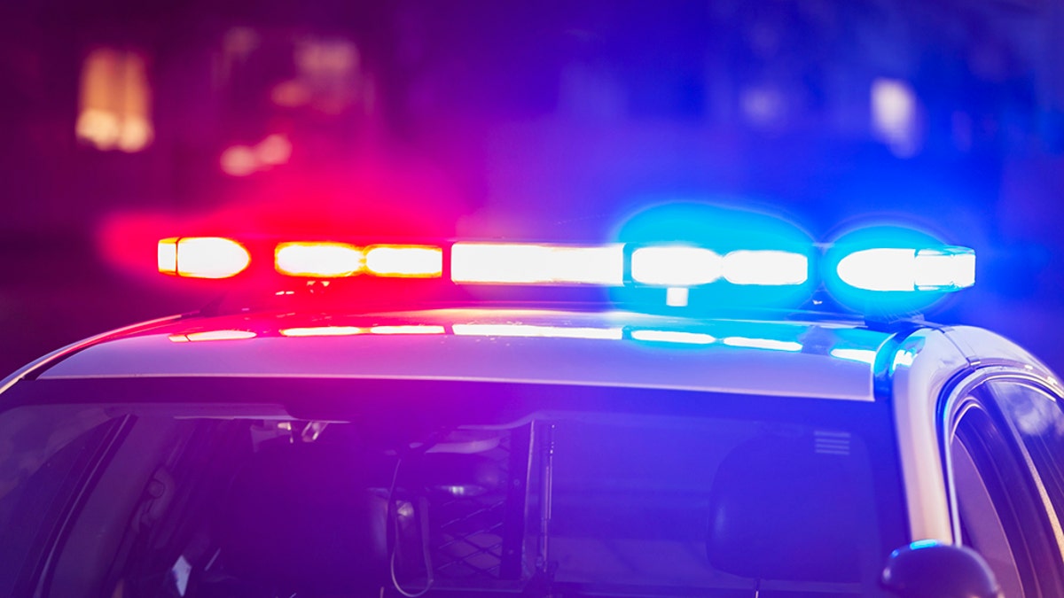 Flashing lights on top of police patrol car