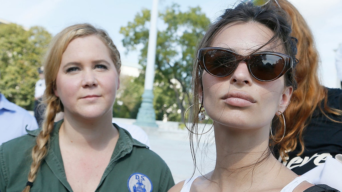 Amy Schumer, left, and Emily Ratajkowski were detained while protesting the Supreme Court nomination of Brett Kavanaugh in Washington, D.C., on Thursday.