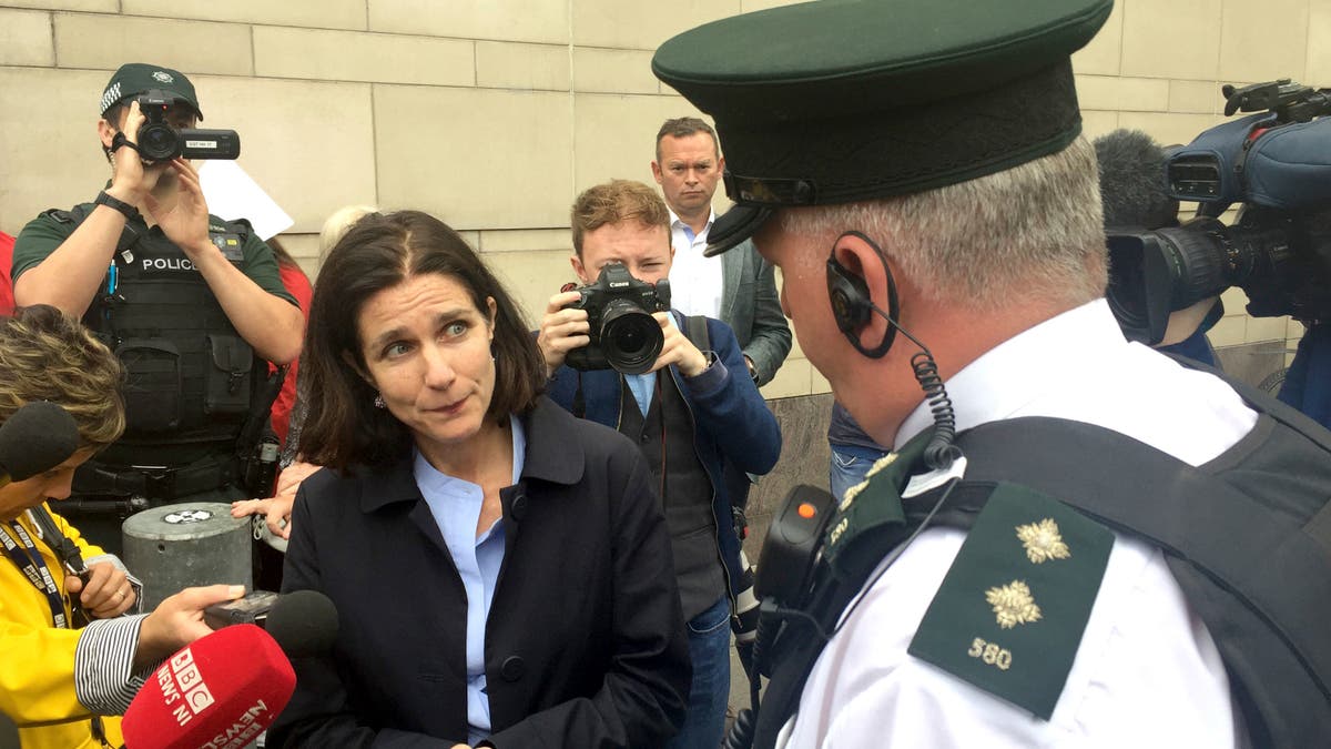 Dr. Rebecca Gomperts discusses abortion pills with a Northern Ireland police inspector on May 31, 2018. Photo credit: David Young/PA Wire (Press Association via AP Images)