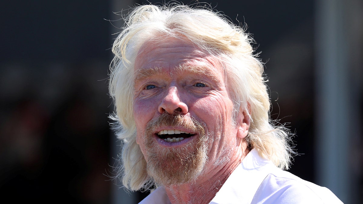 Richard Branson said he's lucky to be alive after he and his son narrowly missed falling rocks while climbing Mount Blanc. (Reuters)