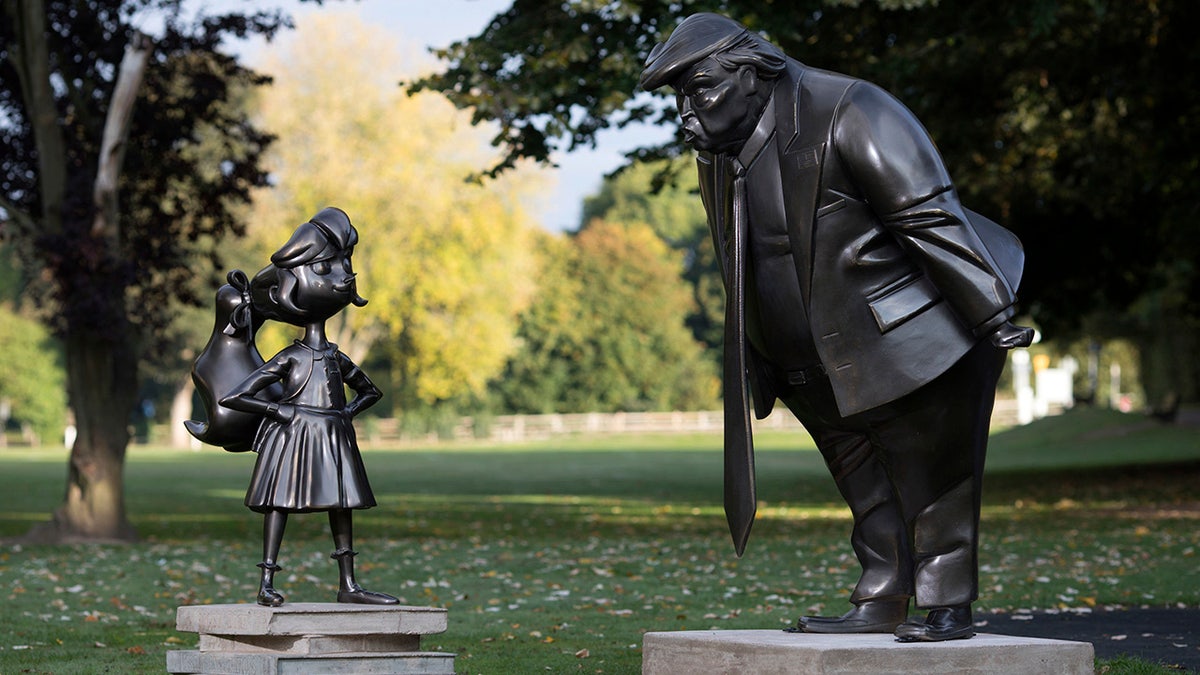 Statues in Great Missenden, England, show the Roald Dahl character Matilda and President Trump together. 