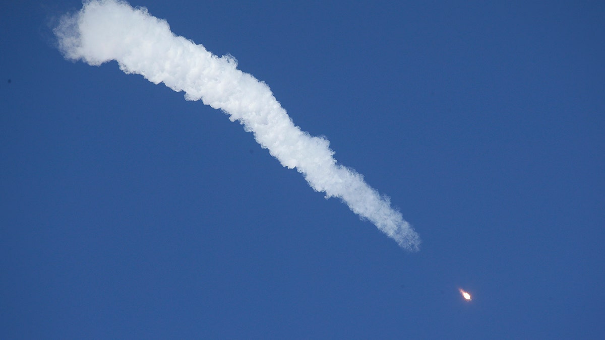 The Soyuz-FG rocket booster with Soyuz MS-10 spaceship shortly after blasting off from Baikonur Cosmodrome in Kazakhstan on Oct. 11, 2008 (AP Photo/Dmitri Lovetsky)