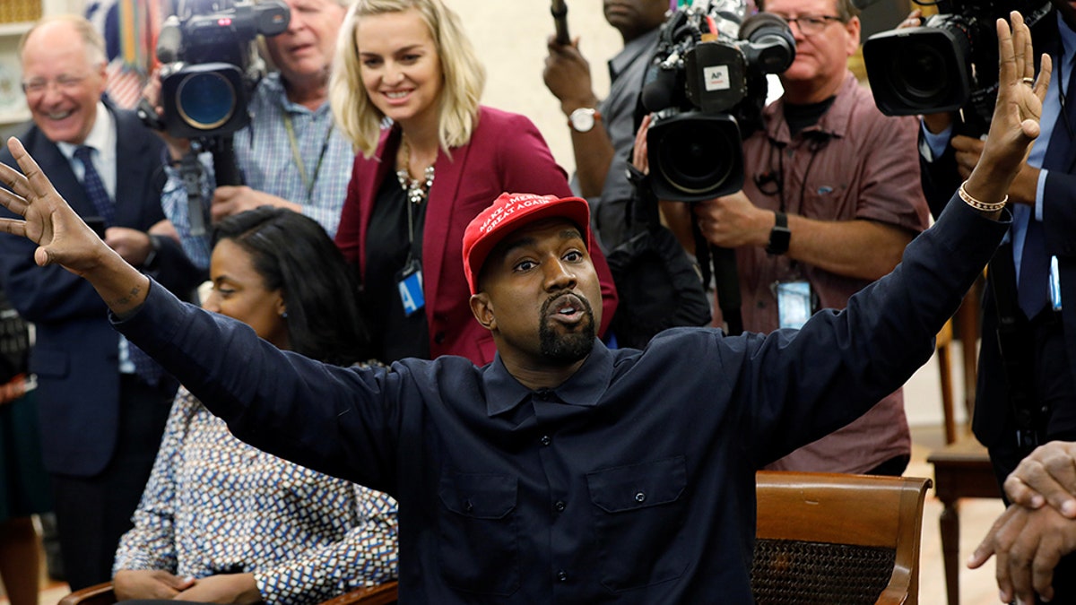 Rapper Kanye West speaks during a meeting with U.S. President Donald Trump in the Oval Office of the White House in Washington, U.S., October 11, 2018. REUTERS/Kevin Lamarque - RC1247601DF0