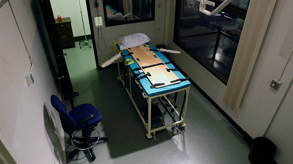 FILE - In this Nov. 20, 2008, file photo, the execution chamber at the Washington State Penitentiary is shown with the witness gallery behind glass at right, in Walla Walla, Wash. Washington state's Supreme Court has ruled that the death penalty violates its Constitution. The ruling Thursday, Oct. 11, 2018, makes Washington the latest state to do away with capital punishment. They ordered that people currently on death row have their sentences converted to life in prison. (AP Photo/Ted S. Warren, File)