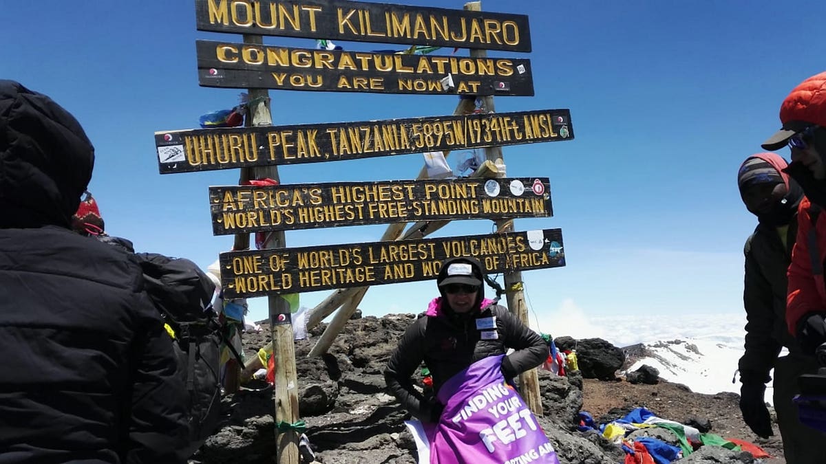 Connie Hutton, 48 climbed Mt. Kilimanjaro after having her hands and feet amputated following a sepsis infection. 