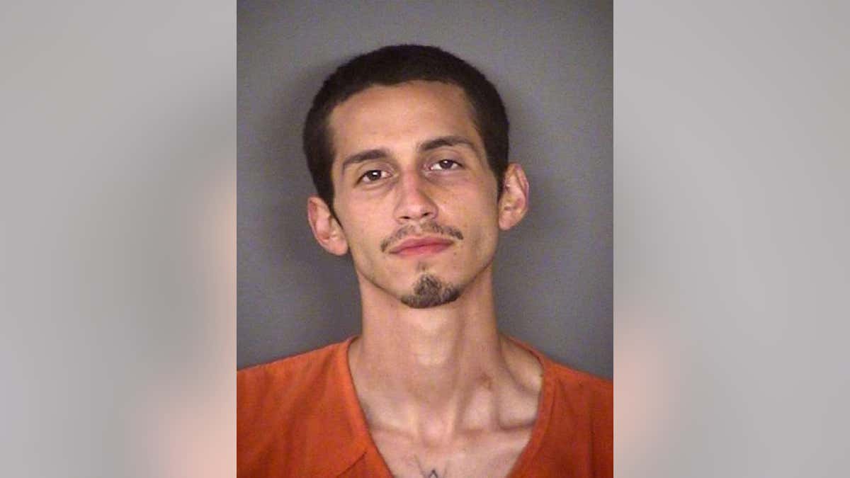 Jesse David Vasquez III, 24, is charged with killing his father, authorities say.