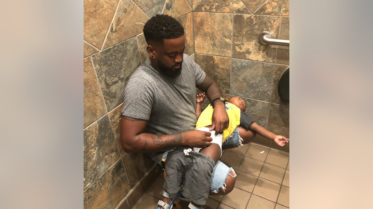 Donte Palmer, a father of three, took to Instagram in September after he once again was forced to change his young son across his lap.
