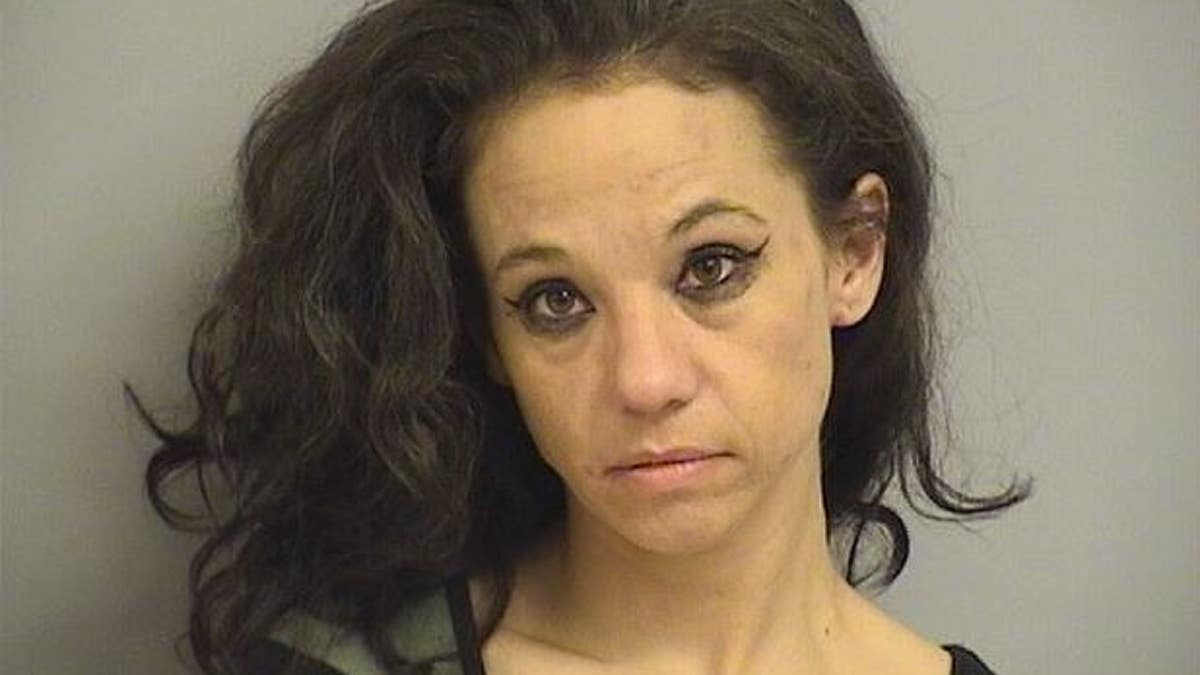 Angie Frost, 37, was captured on body camera stealing a police cruiser.