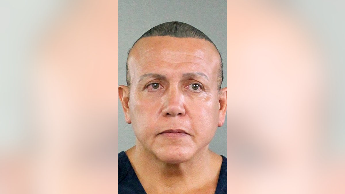 In this undated photo released by the Broward County Sheriff's office, Cesar Sayoc is seen in a booking photo, in Miami. Federal authorities took Sayoc, 56, of Aventura, Fla., into custody Friday, Oct. 26.