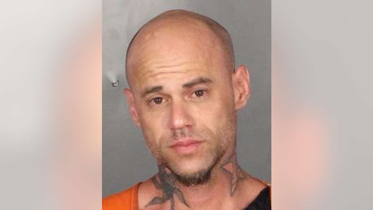 John Wayne Morris, 37, faces charges of burglary with an intent to commit a sexual assault, reports said.