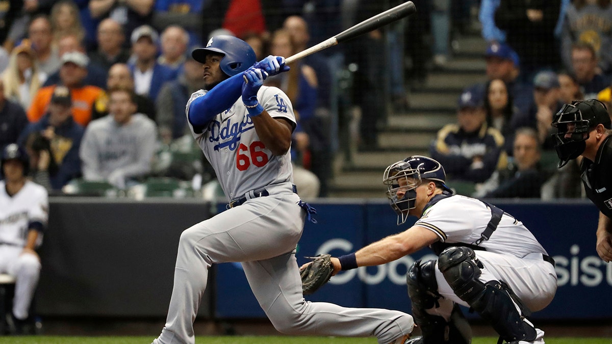 Los Angeles Dodgers slugger Yasiel Puig defected from Cuba in 2012. (AP Photo/Jeff Roberson)