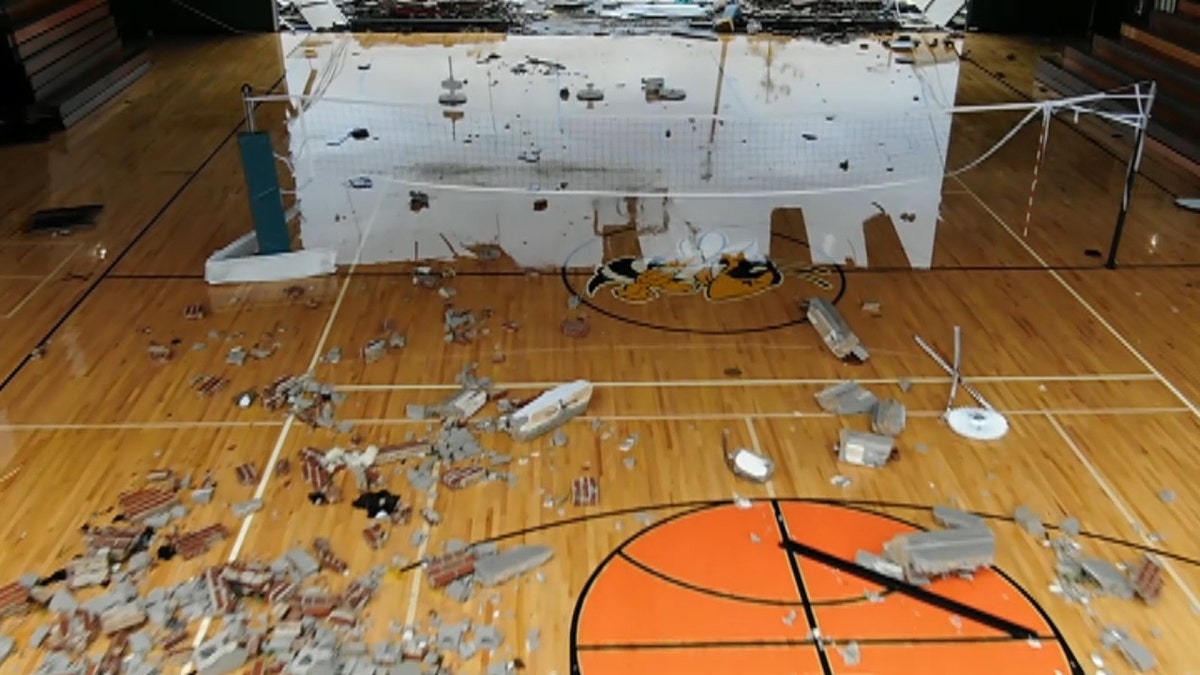 The volleyball net remains standing at Jinks Middle School in Panama City after Hurricane Michael tore through.
