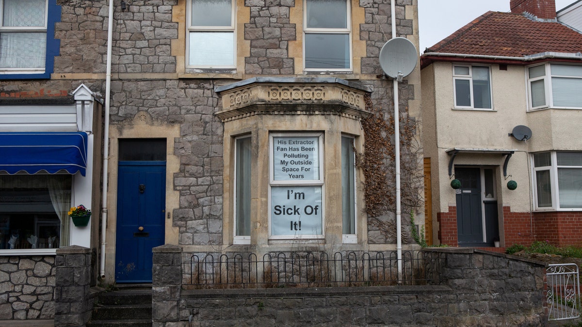 Sign in Richard Evans house window in Weston-super-Mare.