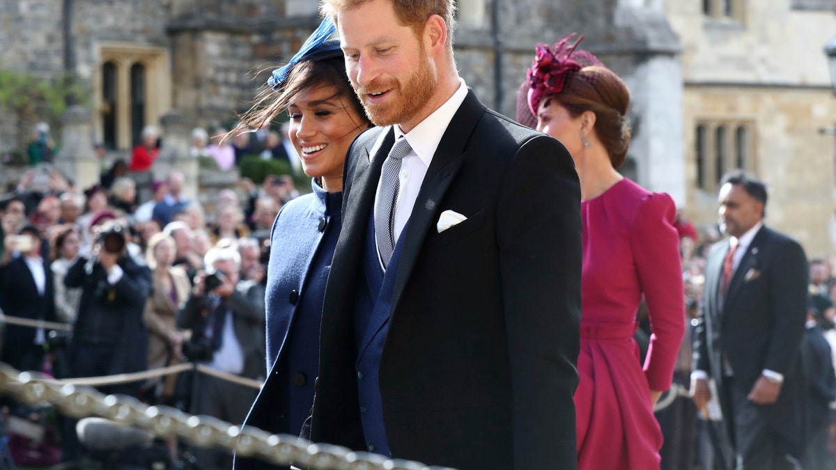 Britain's Prince Harry and Meghan Duchess of Sussex leave after the wedding of Princess Eugenie to Jack Brooksbank.