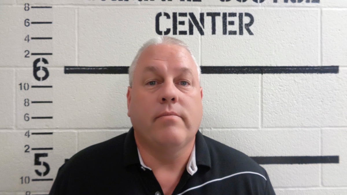 Gary Gunckel, an Oklahoma principal accused of using a wooden paddle to spank two elementary school students, has been charged with child abuse and placed on administrative leave.