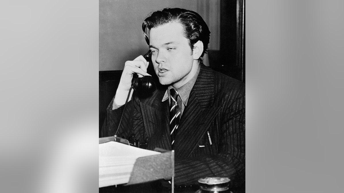 (Original Caption) Orson Welles as he appeared after the radio broadcast War of the Worlds, a dramatic radio version of an imaginary landing of a "Machine from Mars," which causes panic among listeners throughout the United States, October 30. Orson Welles (shown above) adopted the original story by H.G. Wells for the Panic program and also played a principal role.