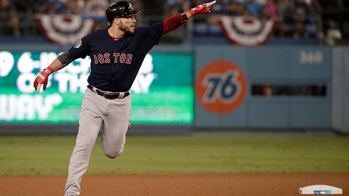 Boston Red Sox's Steve Pearce celebrates after his home run against the Los Angeles Dodgers during the eighth inning in Game 4 of the World Series baseball game on Saturday, Oct. 27, 2018, in Los Angeles. (Associated Press)