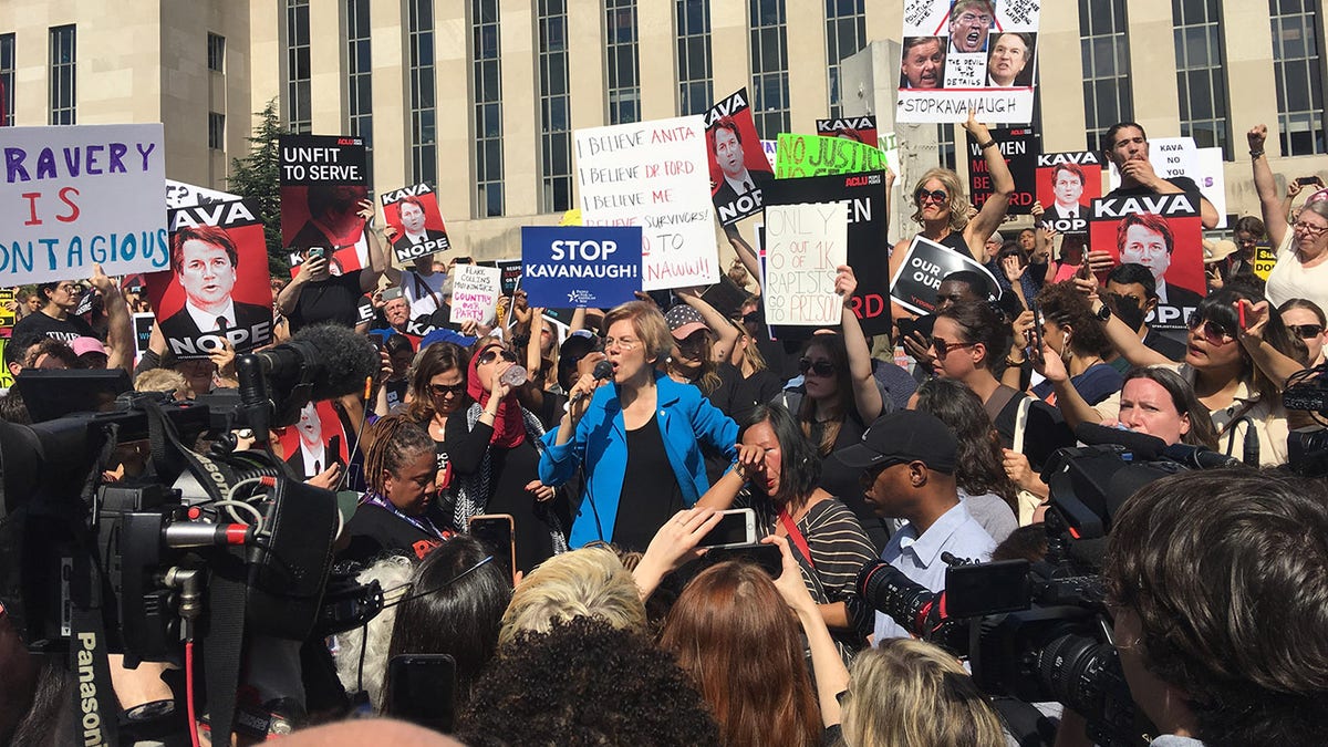 Elizabeth Warren speaks Thursday at an anti-Brett Kavanaugh rally outside the Barrett Prettyman Courthouse in Washington, where Kavanaugh currently works as a United States Circuit Judge. (Alex Pappas/Fox News)