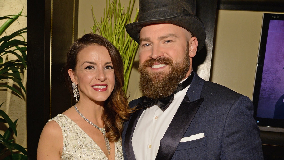 Recording artist Zac Brown, right and his wife Shelly Brown pose backstage during "Sinatra 100: An All-Star GRAMMY Concert" celebrating the late Frank Sinatra's 100th birthday at the Encore Theater at Wynn Las Vegas on December 2, 2015 in Las Vegas, Nevada.